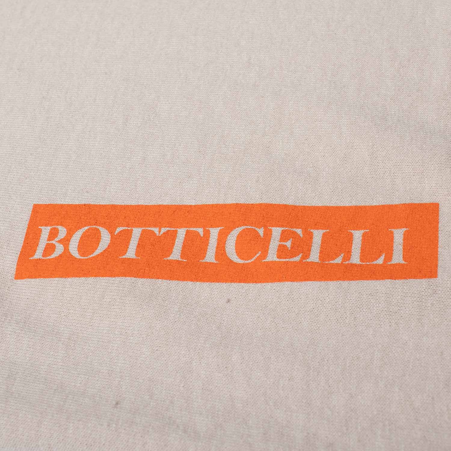 Close-up detail of waist high density ink photo of Altru Apparel's Botticelli Primavera painting with puff ink accents and high-density ink on front chest and waist.