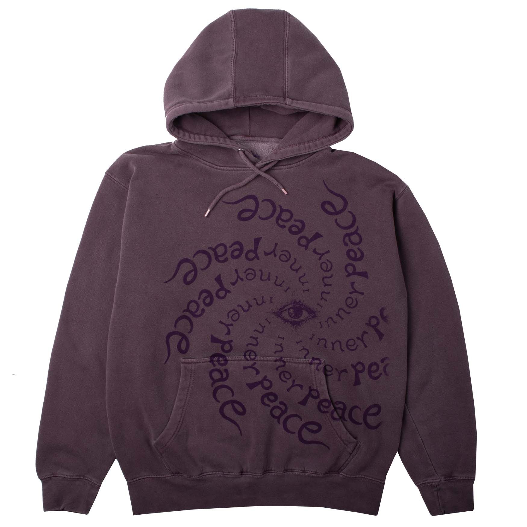 Full front of hoodie photo showing pockets, hood, drawcord all on a purple hoodie with graphics. The art is of many repetitions of "Inner Peace" text circling an "all seeing eye". Garment dyed and washed for soft vintage look and feel.