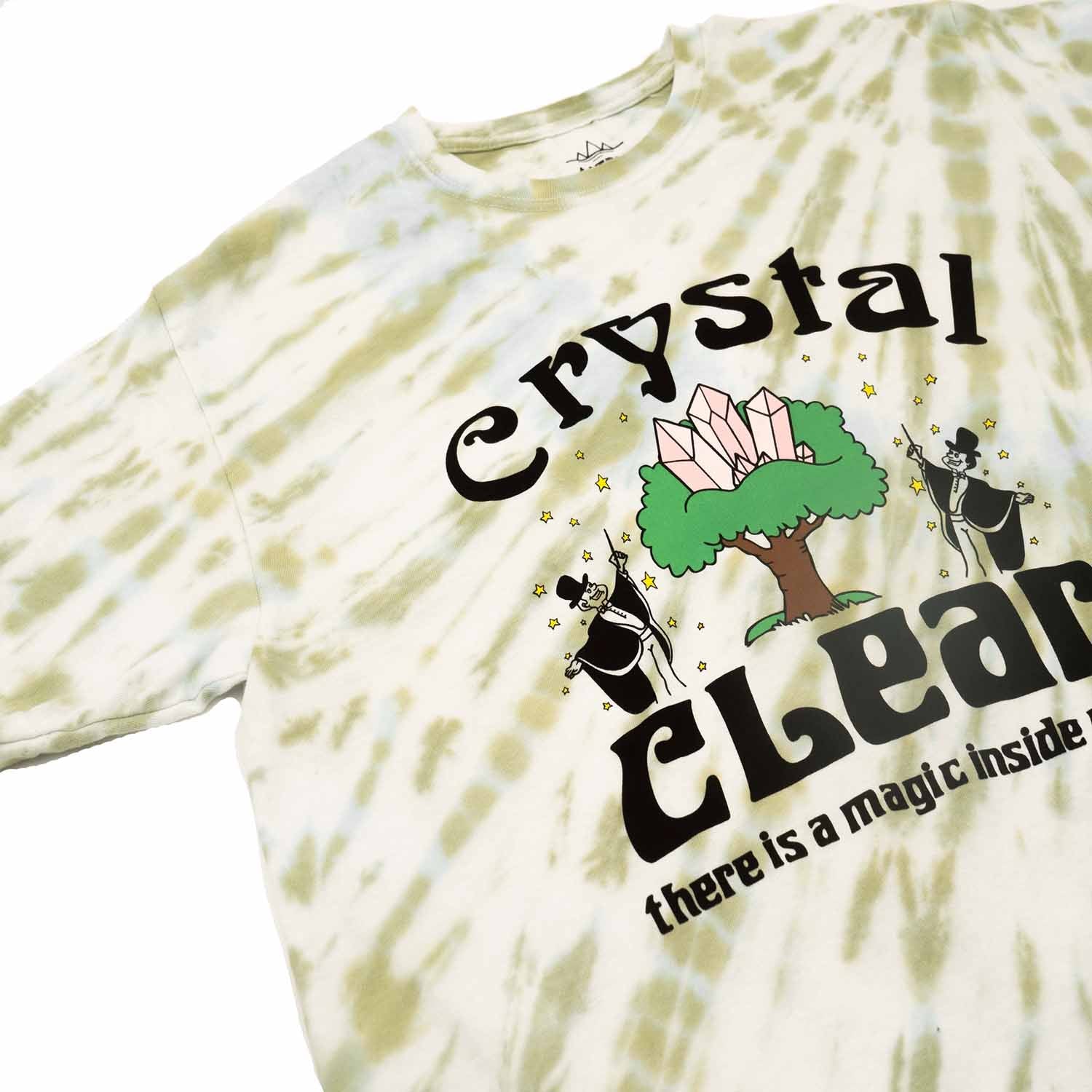 Green and white tie dye with graphic of crystals, tree, magician and motivational text screen printed on front of men's graphic tee. Front detail photo. #2