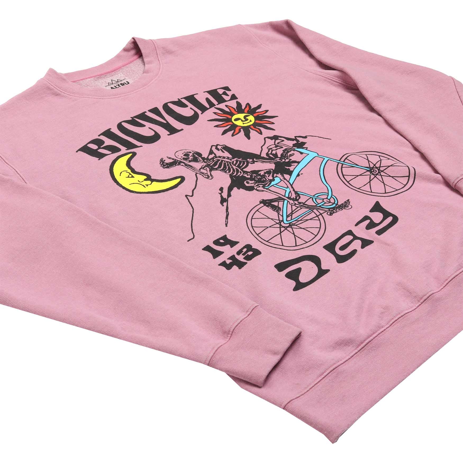 up close detail 3 of Altru mens pink fleece sweatshirt with a skeleton riding a bicycle graphic on front and the text "If the doors of perception were cleansed every thing would appear to man as it is, infinite."  printed on the back.