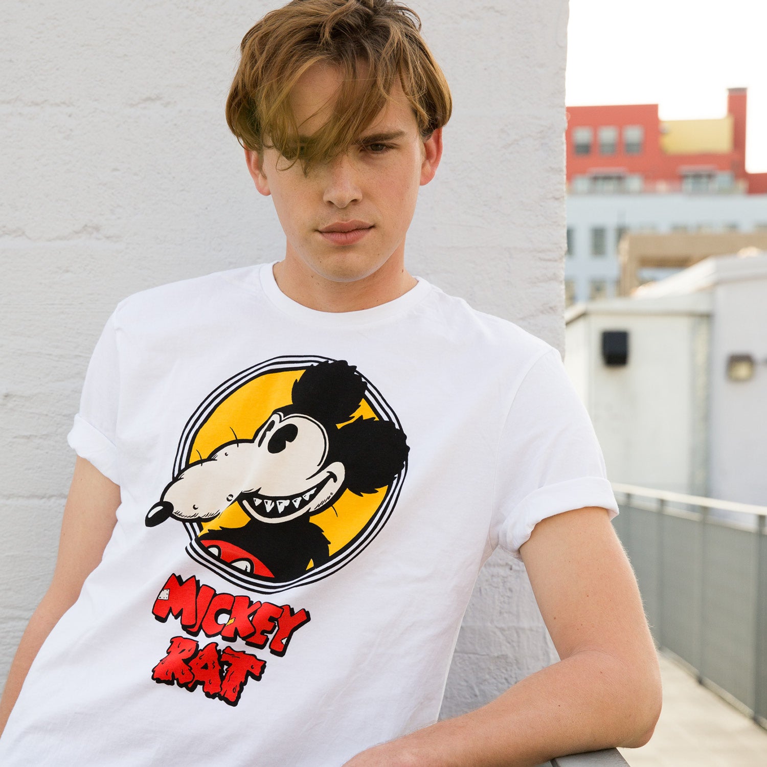 Altru Apparel Mickey Rat classic spotlight pose on white graphic tee by Robert Armstong. T-shirts Full front photo on a male model.